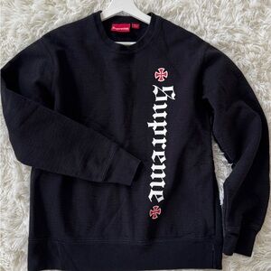 Supreme men’s black limited edition pullover sweatshirt, size M.